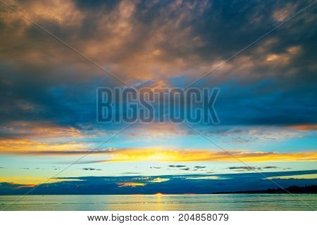 Summer holiday by the sea. Sunset on the seashore. City View Walk along the seafront