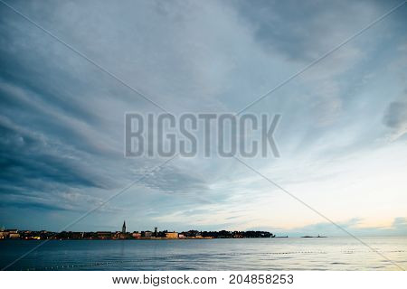 Summer holiday by the sea. Sunset on the seashore. City View Walk along the seafront