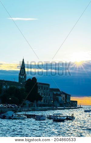 Sunset On The Seashore. City View Walk Along The Seafront