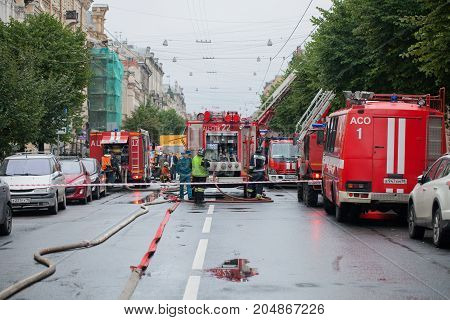 Saint Petersburg, Russia, on the morning of September 13, 2017. Firefighters extinguish a large fire on the roof of a residential house on the street Tchaikovsky 31.