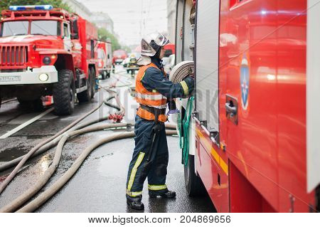 Saint Petersburg, Russia, on the morning of September 13, 2017. Firefighters extinguish a large fire on the roof of a residential house on the street Tchaikovsky 31.