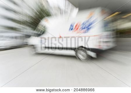 A Ambulance in the city in front of an ambulance