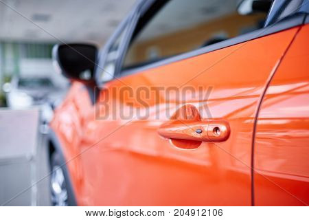 Beautiful exterior of a modern car. New cars in the showroom.