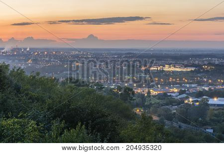 Tarnow Poland - September 18 2017: Sunset over the city. In the city landscape you can see the train station the nitrogen fertilizer plant and residential and service buildings.