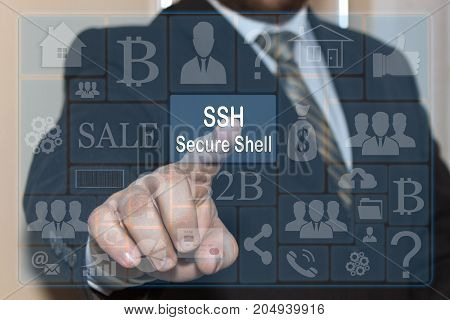 The businessman clicks on the SSH Secure Shell on a touch screen