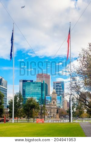 Adelaide Australia - June 28 2017: Victoria Square fountain viewed from South to North with office buildings at morning time