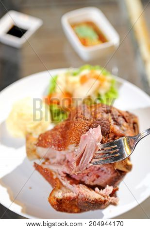 close up of fried of leg pork for party