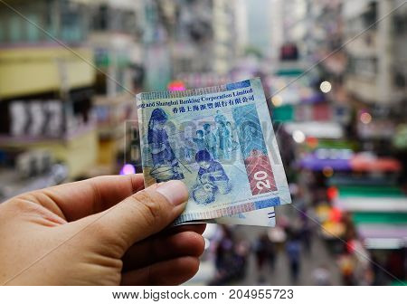 Hand Holding Hong Kong Dollar (hkd) Billnotes