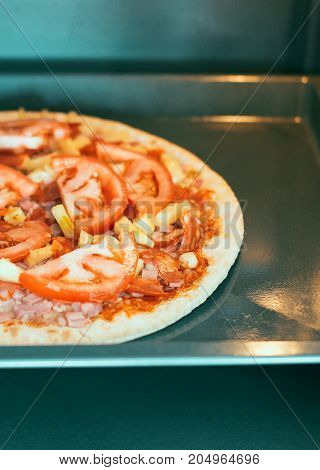 Homemade Pizza With Tomatoes In Hot Oven.