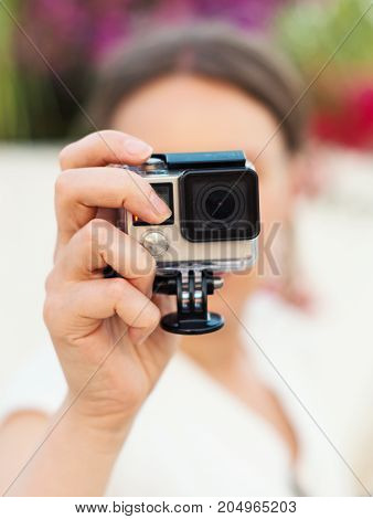 A Woman Shooting With The Action Camera.