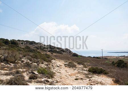 landscape of a natural park Capo Greco near Ayia Napa, Cyprus, rocks and plants