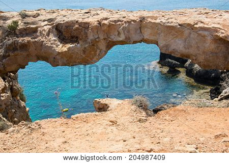 Stone bridge in the park of Cavo Greco close