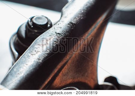 Skateboard hander and kingpin close up. Professional extreme sport. Repairing and renewal of skateboarding elements, safety construction