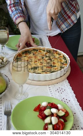 A Gourmet Lunch: Spinach Pie With Cheese, A Bowl Of Fruits, A Salad And Wine.