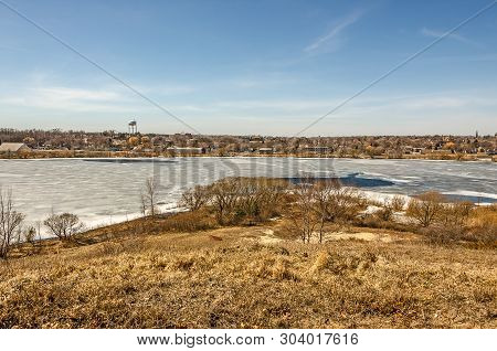 Manistee Lake Losing Its Winter Ice And Showing Areas Of Blue Water