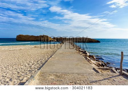 Landscape Of The Al Qurayyah Beach With The Background Of The Mediterrenean Sea In Monastir, Tunisia