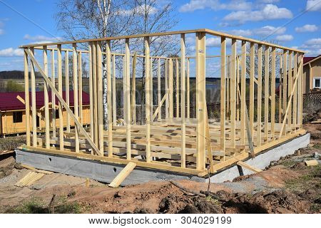 Construction Home Framing Against Blue Sky.wood Frame Residential Building Under Construction.buildi