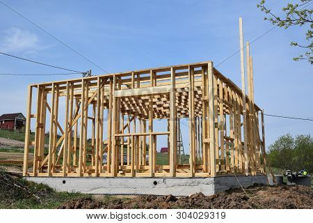 Construction Home Framing Against Blue Sky.wood Frame Residential Building Under Construction.buildi