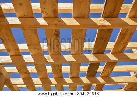 Wood Frame Residential Building Under Construction.building Construction, Wood Framing Structure At
