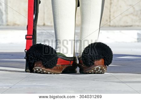 Greek National Uniform Soldier Evzona-tsaruhi In Athens At The Post