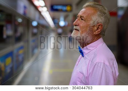 Handsome Senior Tourist Man Exploring The City Of Bangkok, Thail