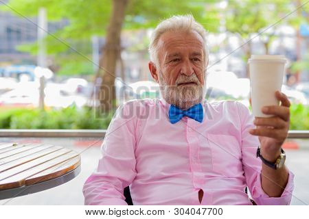 Handsome Senior Tourist Man Exploring The City Of Bangkok, Thail