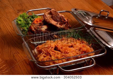 Potatoes And Meat On A Baking Tray