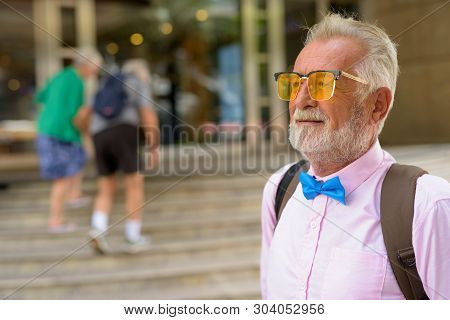 Handsome Senior Tourist Man Exploring The City Of Bangkok, Thail