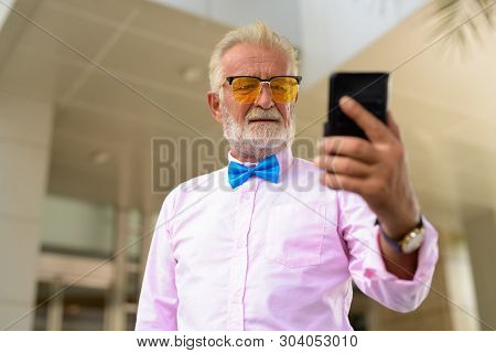 Handsome Senior Tourist Man Exploring The City Of Bangkok, Thail