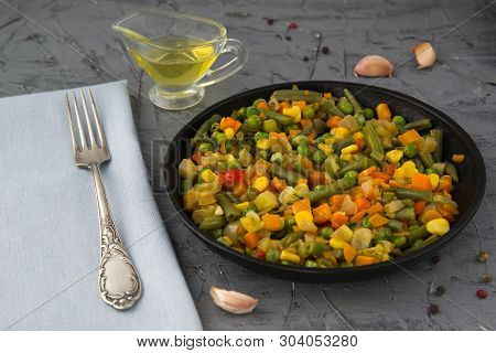 Cooked Chopped Vegetables In A Boiling Pan With Spices. Vegan Food.