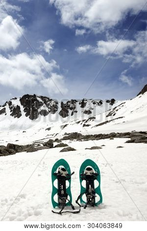 Snowshoes In Snowy Mountains And Blue Cloudy Sky. Turkey, Kachkar Mountains, Highest Part Of Pontic 
