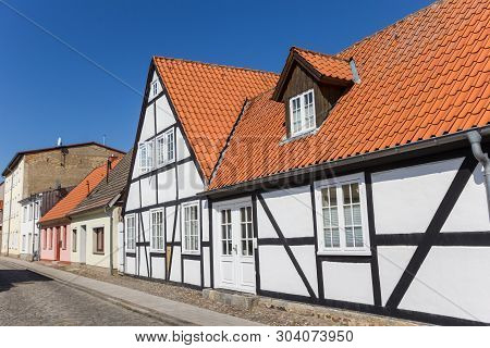 White Half Timbered House In The Old Town Of Grimmen, Germany