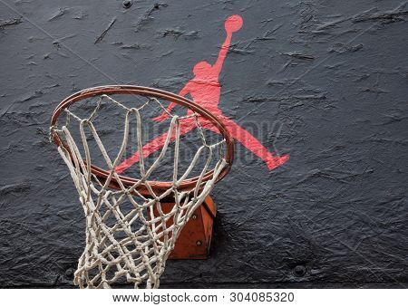 Kyiv, Ukraine -  April 21, 2016: Jumpman Logo By Nike Painted On The Black Backboard Of The Old Bask