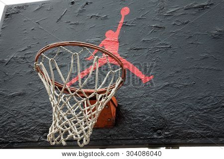 Kyiv, Ukraine -  April 21, 2016: Jumpman Logo By Nike Painted On The Black Backboard Of The Old Bask