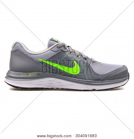 Vienna, Austria - August 10, 2017: Nike Dual Fusion X 2 Grey And Green Sneaker On White Background.