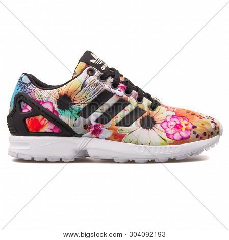 Vienna, Austria - August 10, 2017: Adidas Zx Flux Floral Print Multi Color Sneaker On White Backgrou