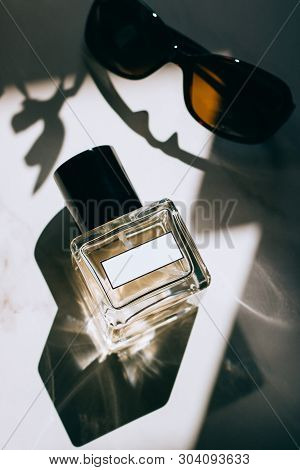 Perfume Bottles With Blank Labels And Sunglasses