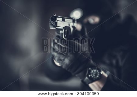 Counter Terrorist With Gun. Shallow Depth Of Field Firearm Closeup Photo. Special Forces Theme.