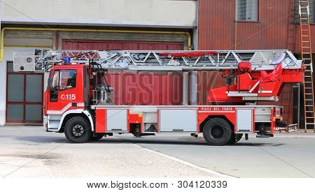 Rome, Italy - May 16, 2019: Red Fire Engine Of Italian Firefighters With The Number 115 To Call In A