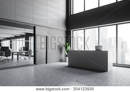 White Reception In Gray Office Corner
