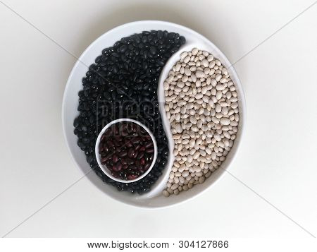 Three Colors Of Beans On A Yin Yang Plate