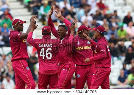 NOTTINGHAM, ENGLAND. 31 MAY 2019: Sheldon Cottrell of West Indies celebrates taking the wicket of Imam-ul-Haq of Pakistan during the West Indies vs Pakistan, ICC Cricket World Cup match