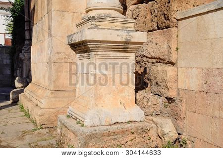 Element Columns Of Ancient Structures. Hadrians Gate, Antalya Landmark. Ancient Construction Of The 