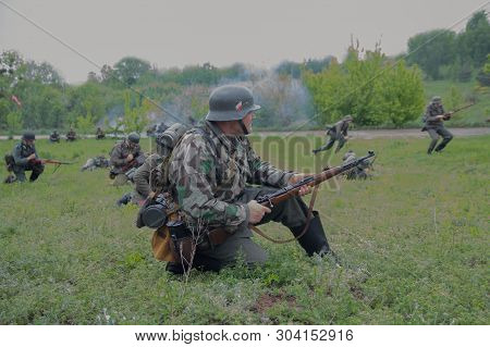 Kiev, Ukraine - May 09. 2019: Men In The Form Of Wehrmacht Soldiers During A Battle Showdown At The 