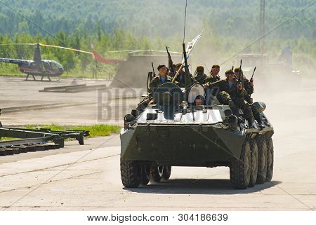 Nizhniy Tagil, Russia - July 12. 2008: Group Of Special Forces Unload From Btr-82a Armoured Personne