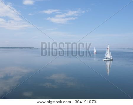 Goczalkowice, Poland On May 2019: Two White Yachts On Beauty Landscapes Of Artificial European Reser