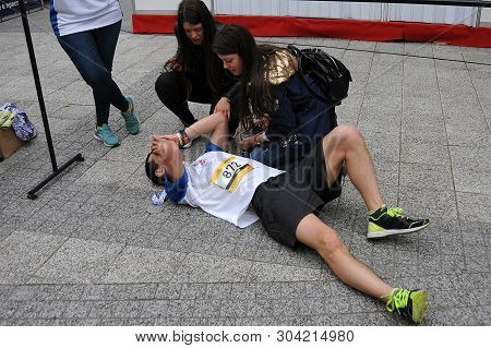 Plovdiv, Bulgaria - May 5, 2019: Unidentified Half-marathon Male Runner Collapsed After Crossing The