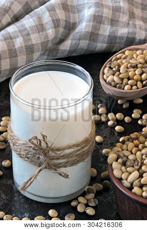 Scattered Soybeans. Soy Milk. Vegan Milk. Keto Diet.