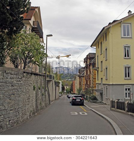 The Street In Luzern Against Background Of Pilatus Mountain