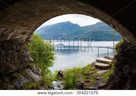 Norwegian Landscape. Green Mountains Hills And Fjord Saudafjord On Overcast Weather, View From Svand
